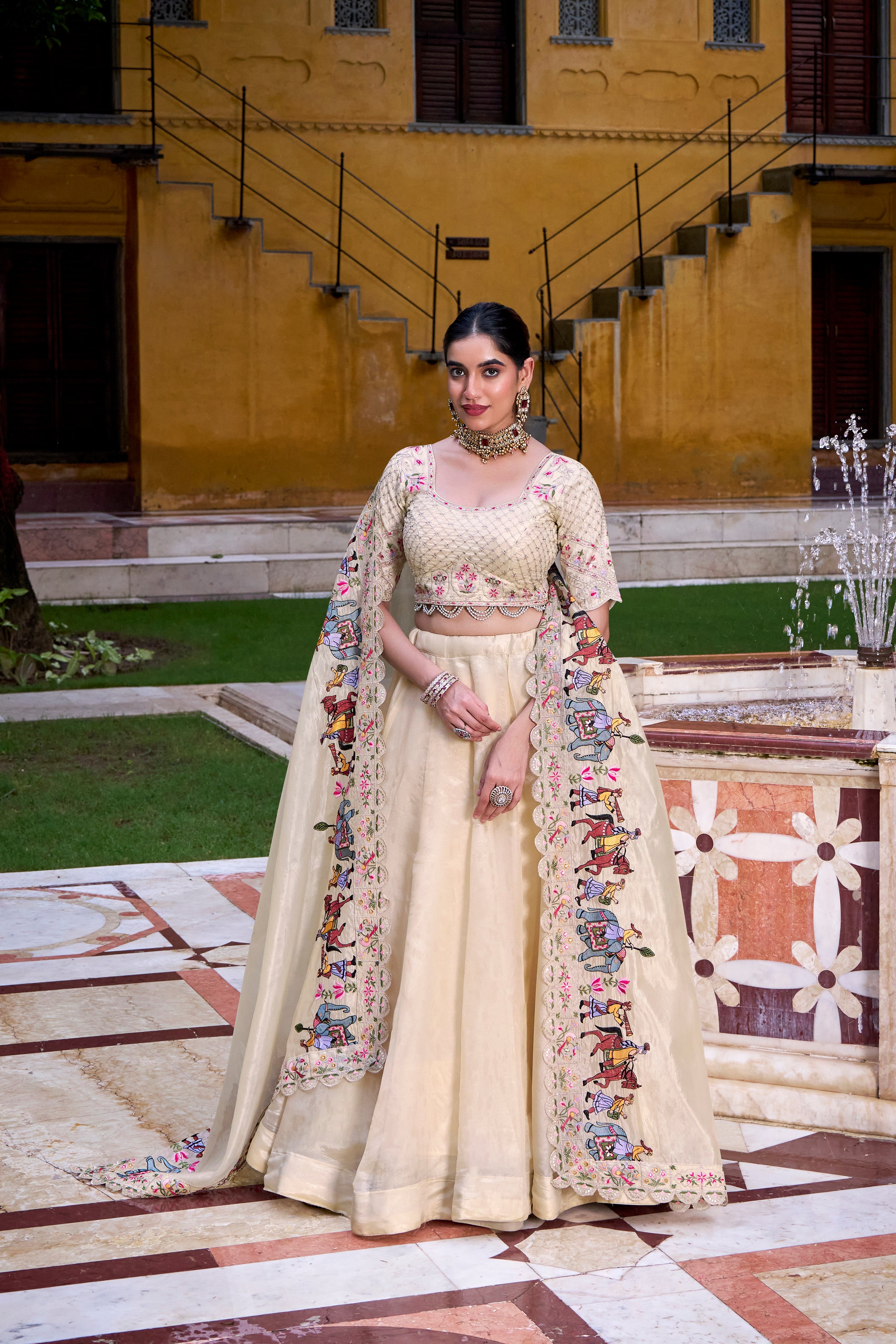 Elegant Cream Lehenga with a Hand-Embroidered Baraat Dupatta