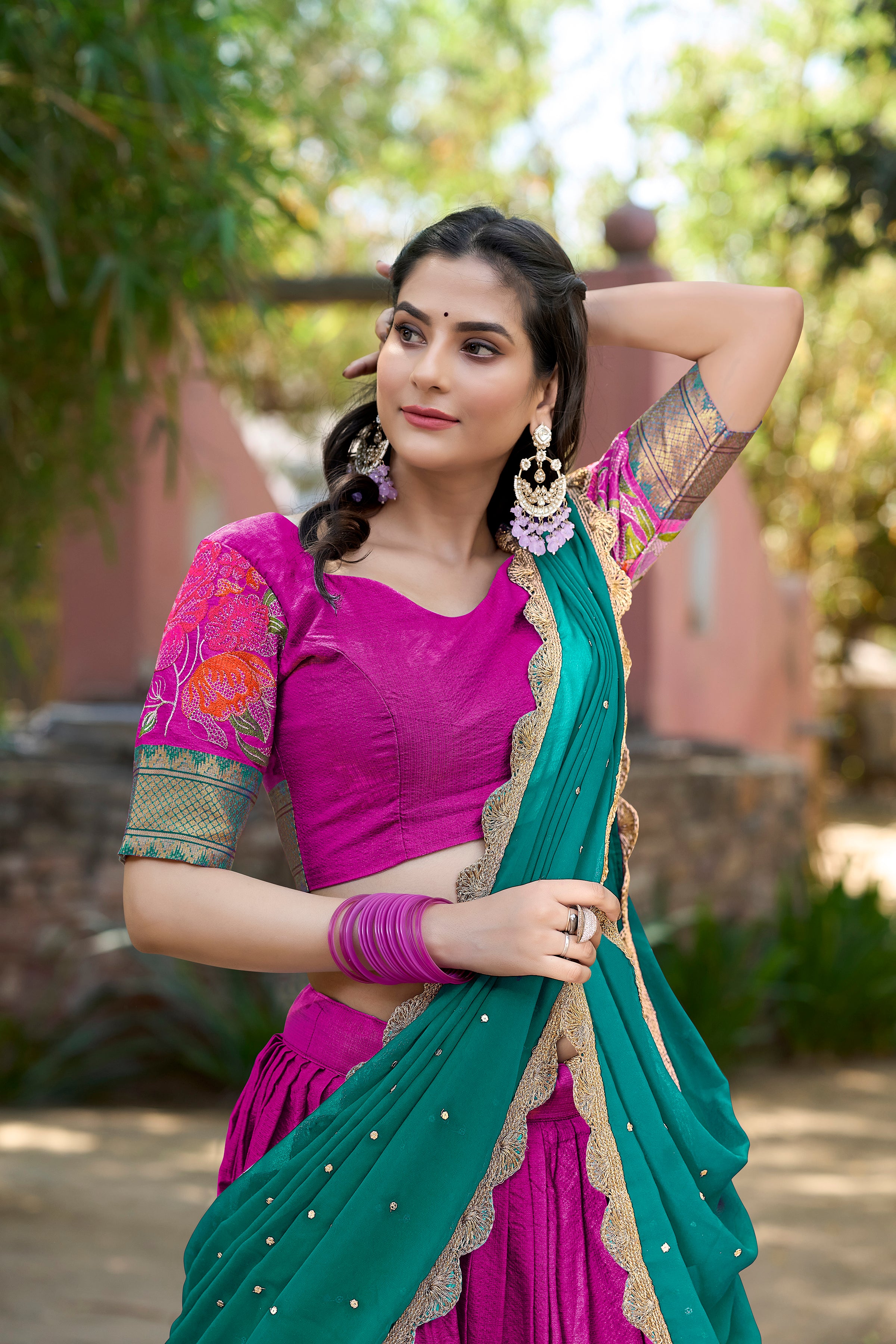 A vision of traditional grace in a floral lavender and purple lehenga.