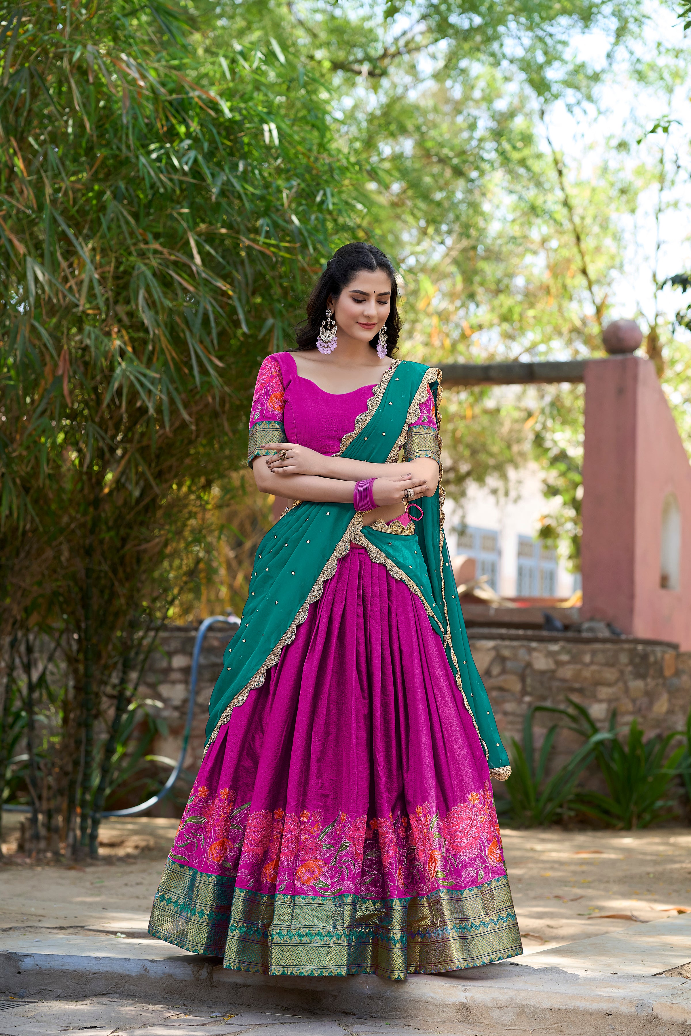 A vision of traditional grace in a floral lavender and purple lehenga.