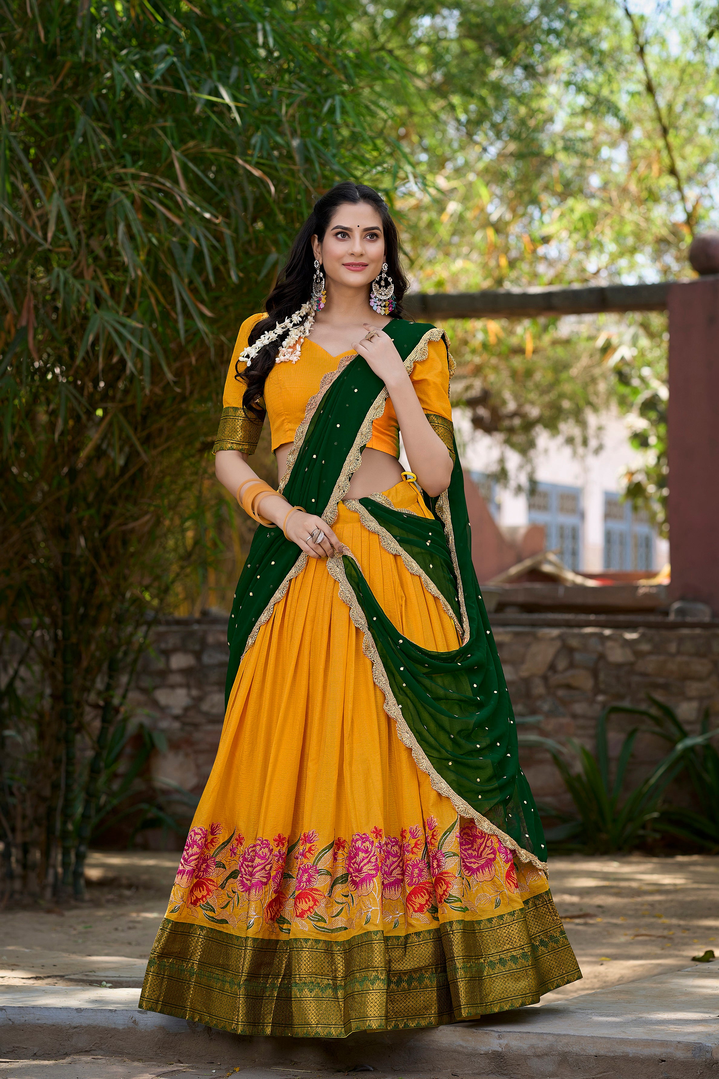 A vision of traditional grace in a floral lavender and purple lehenga.