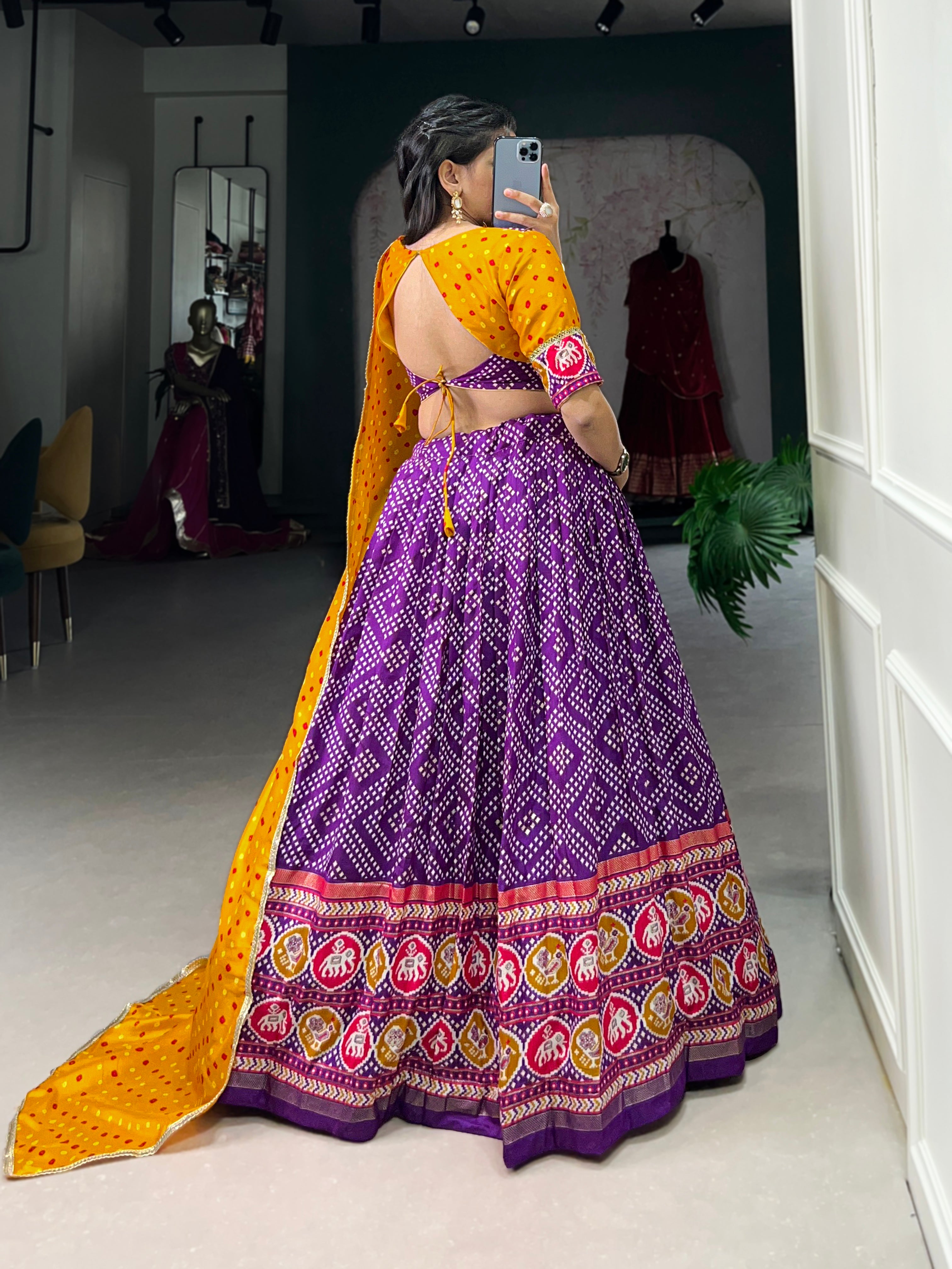 Vibrant Purple Bandhani Chaniya Choli with Patola Border