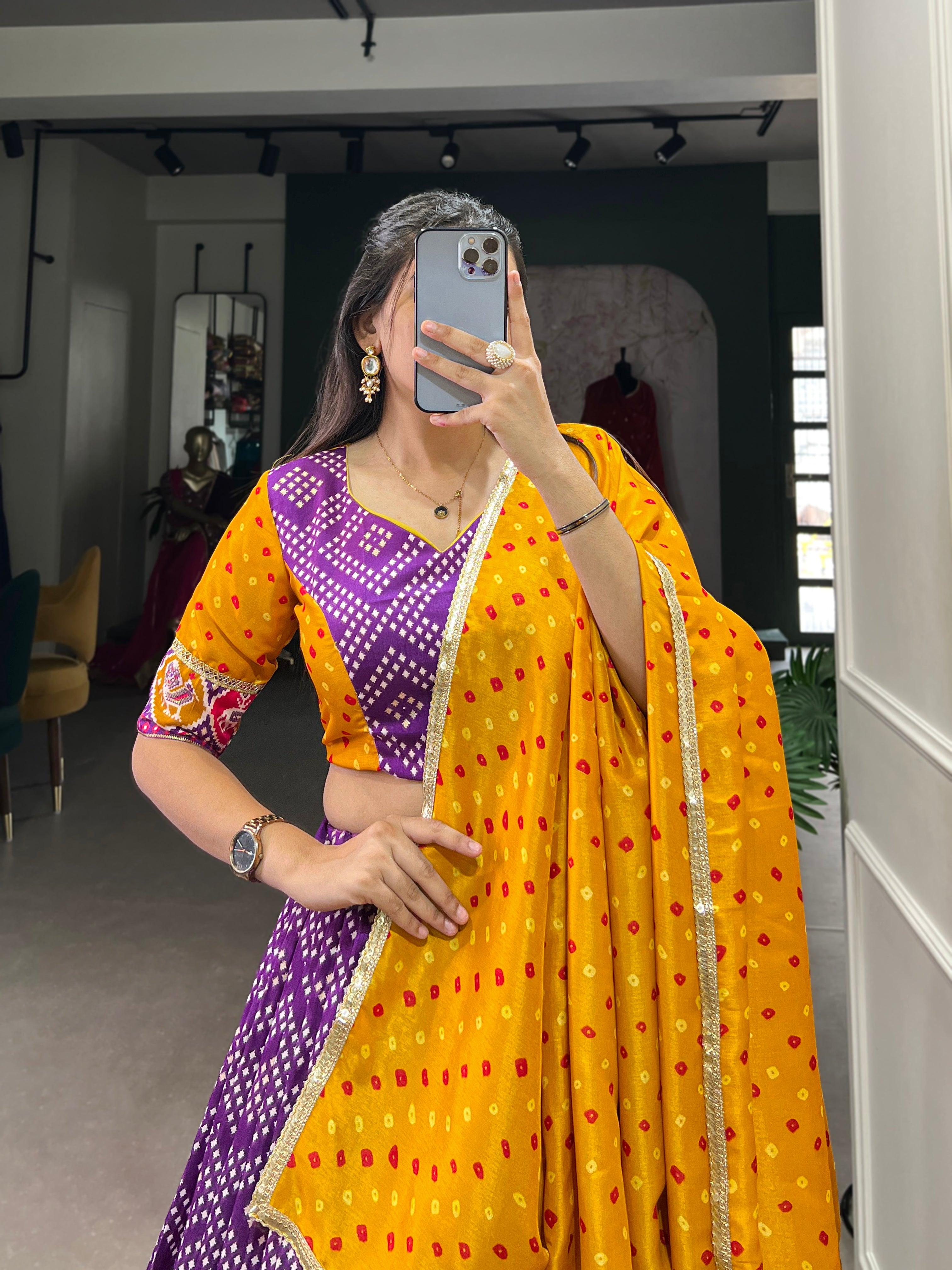 Vibrant Purple Bandhani Chaniya Choli with Patola Border