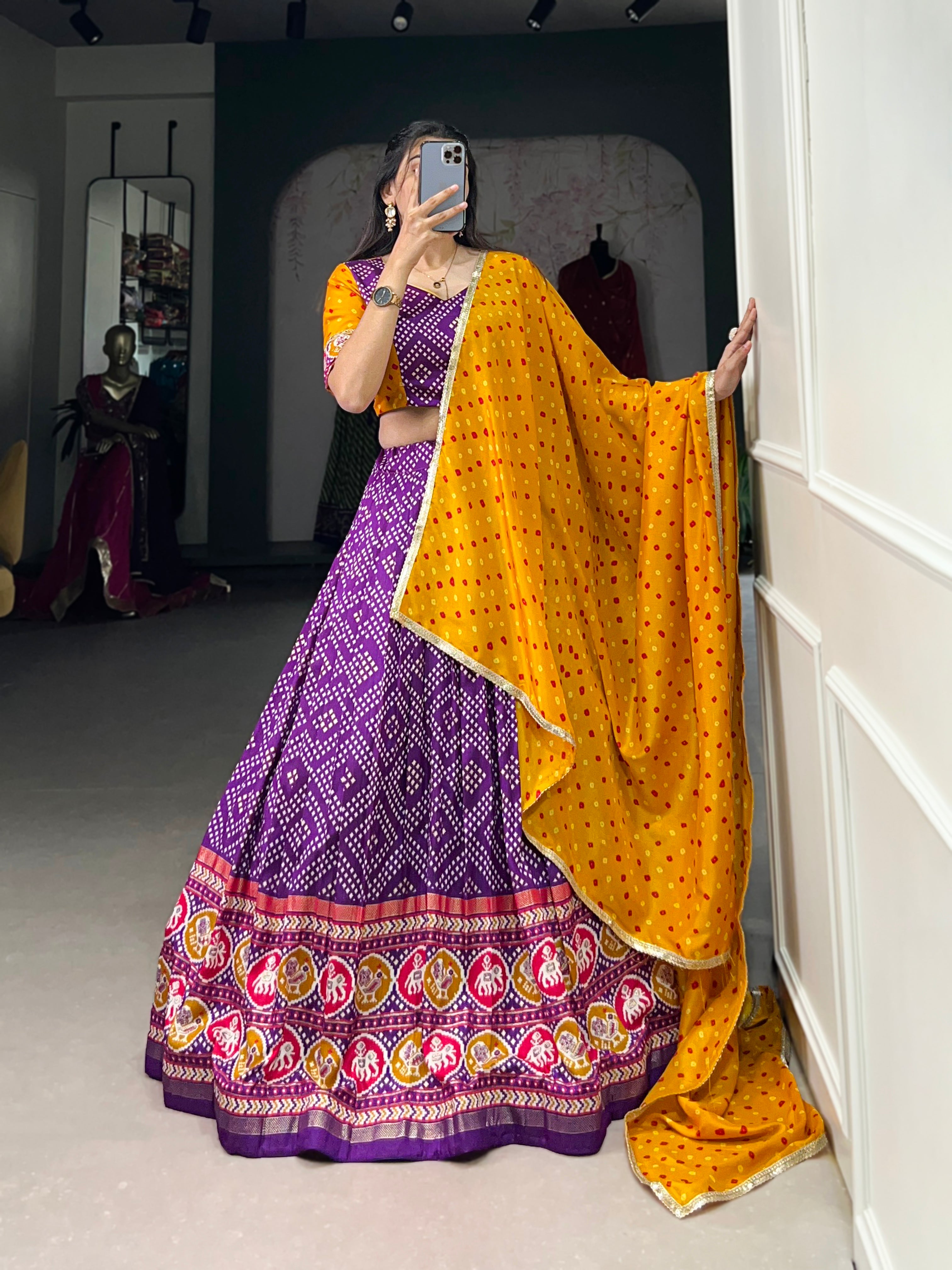 Vibrant Purple Bandhani Chaniya Choli with Patola Border