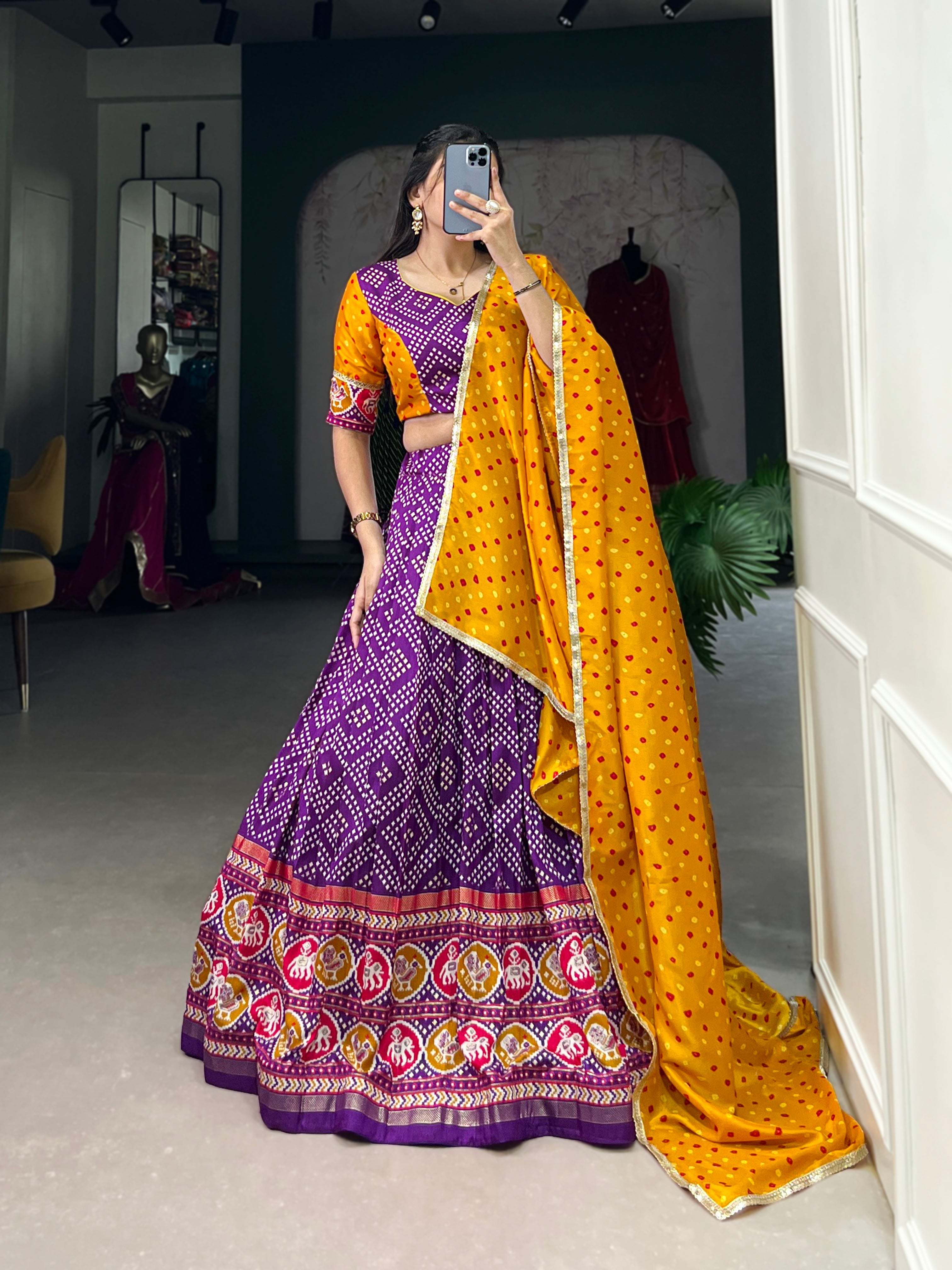 Vibrant Purple Bandhani Chaniya Choli with Patola Border