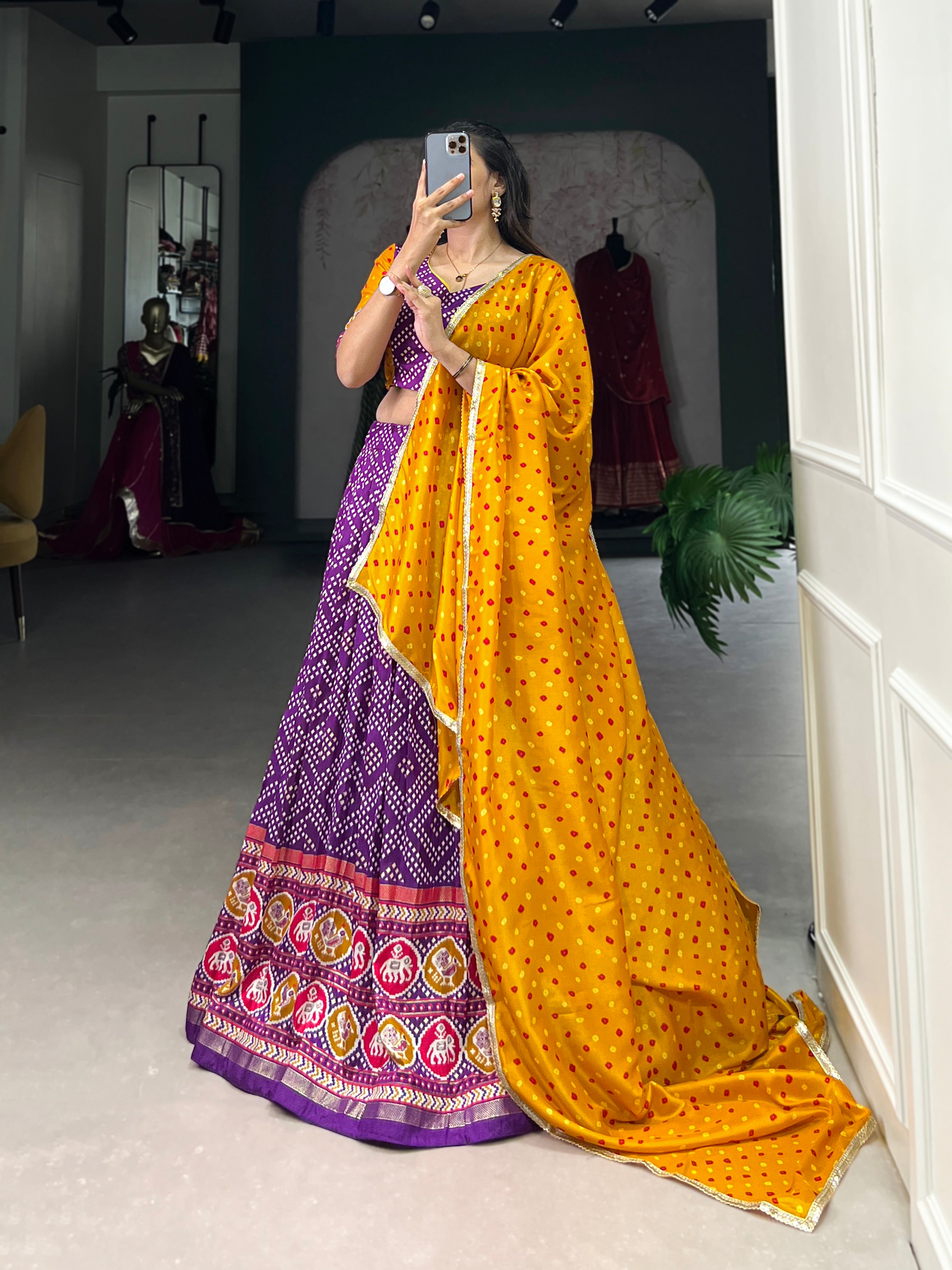 Vibrant Purple Bandhani Chaniya Choli with Patola Border