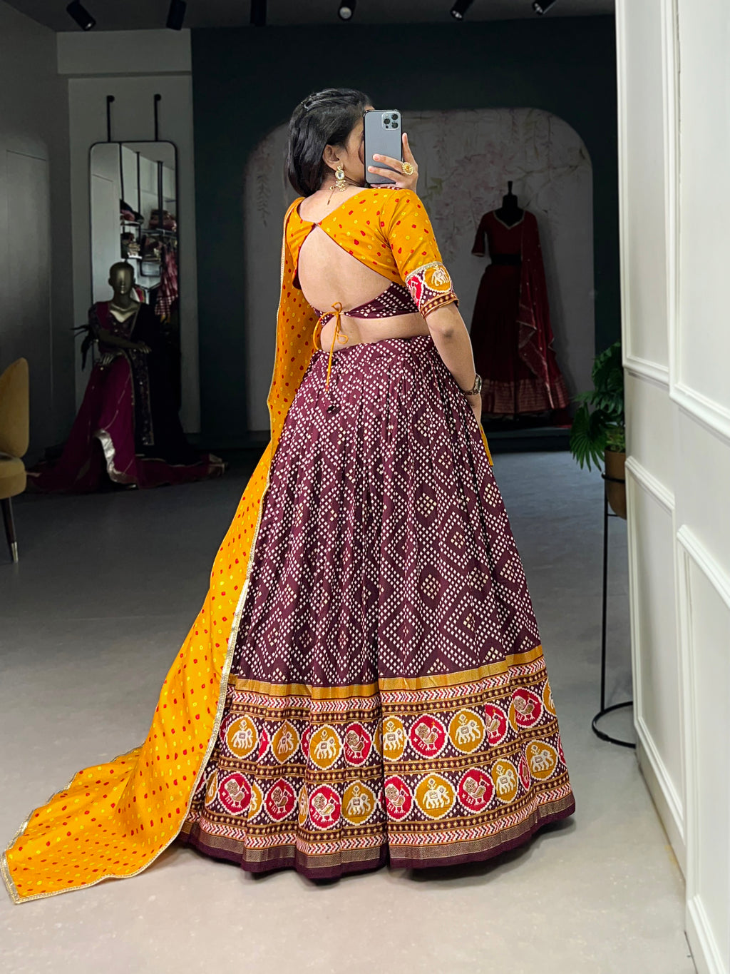 Vibrant Purple Bandhani Chaniya Choli with Patola Border