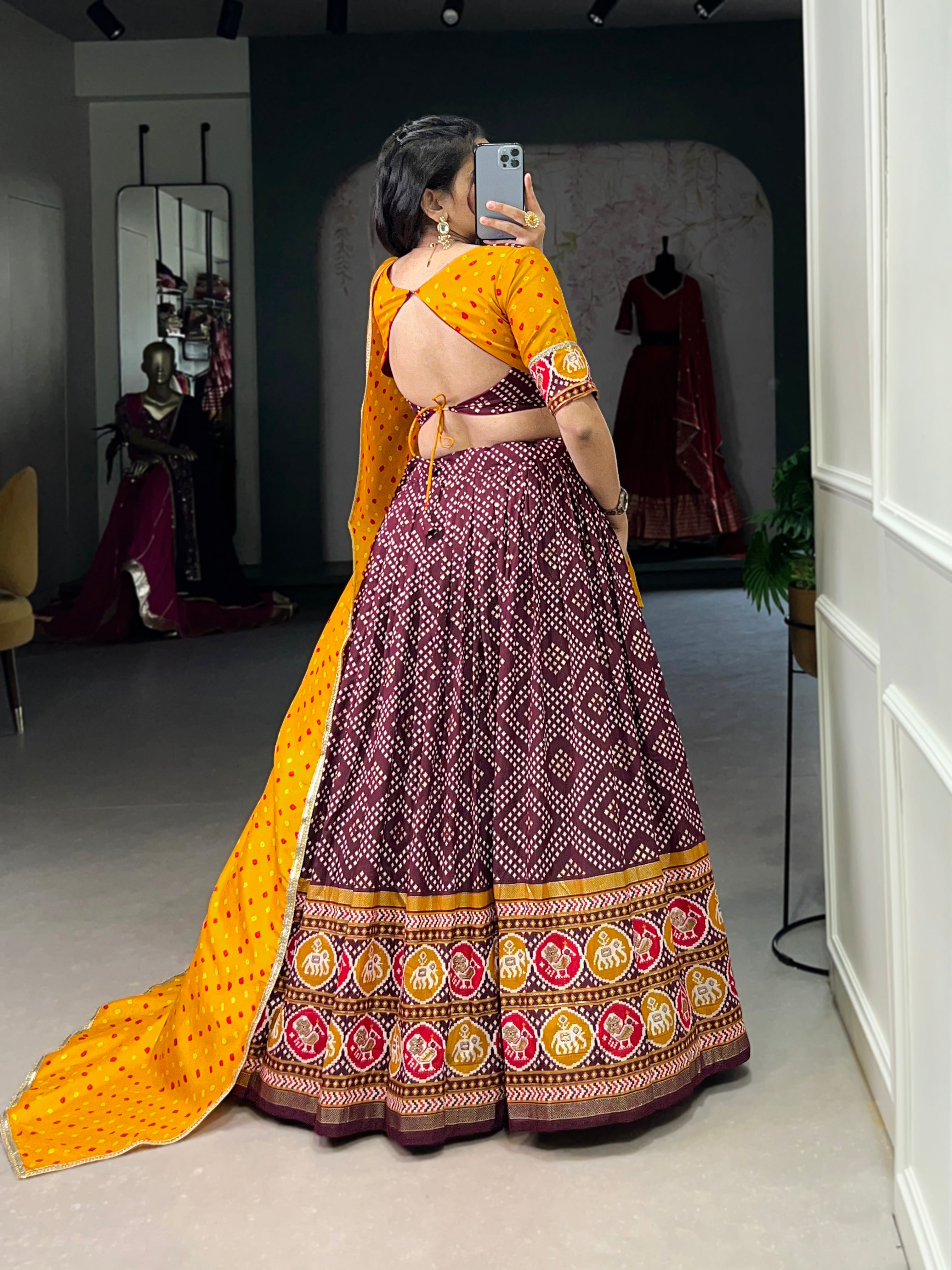 Vibrant Purple Bandhani Chaniya Choli with Patola Border