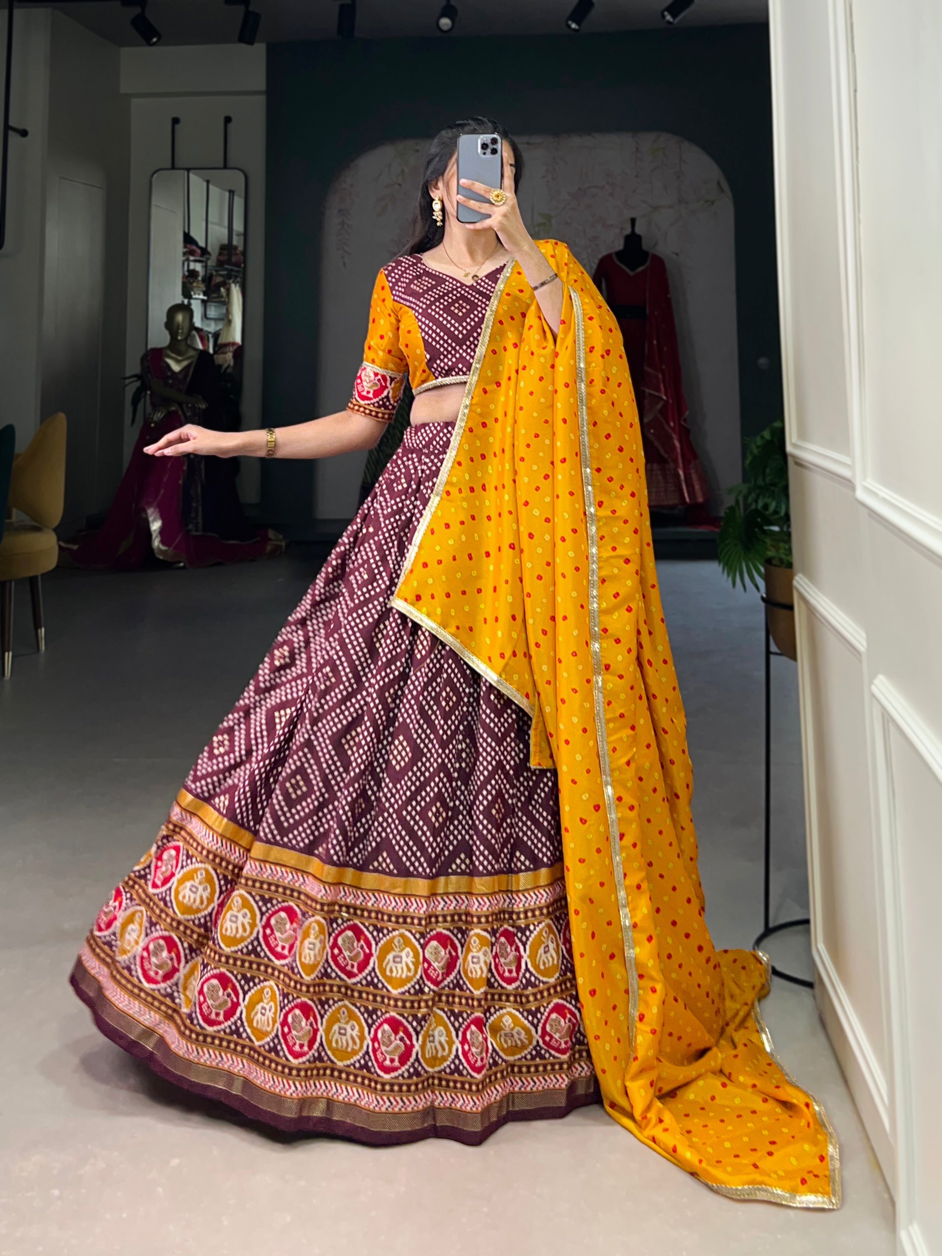 Vibrant Purple Bandhani Chaniya Choli with Patola Border