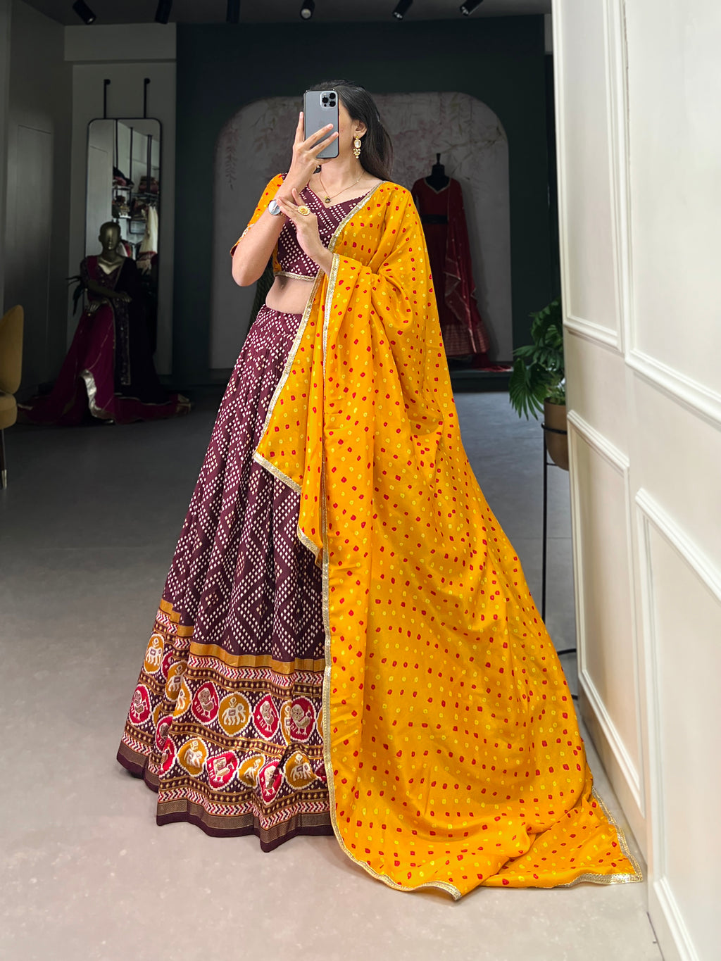 Vibrant Purple Bandhani Chaniya Choli with Patola Border