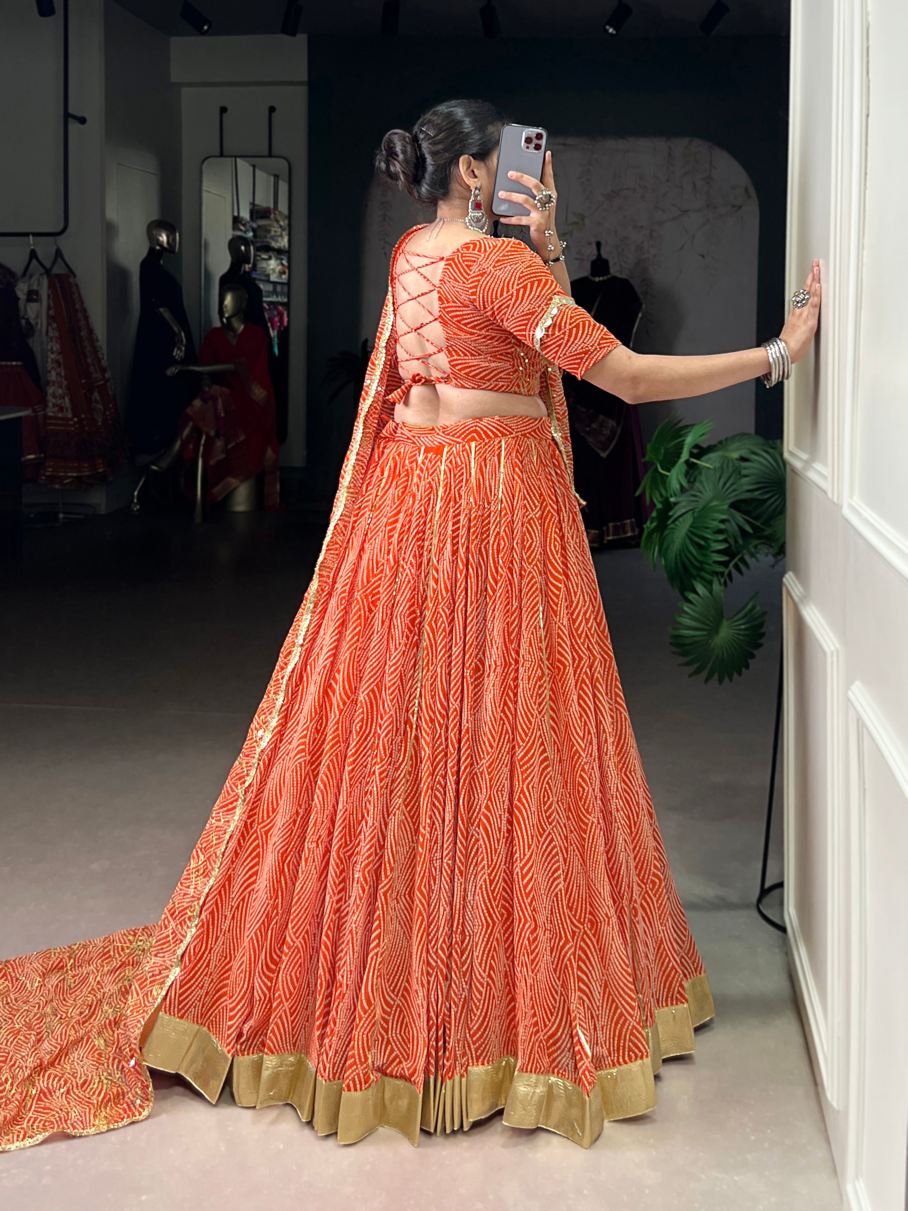 Bandhej-inspired lehenga with golden lace detailing