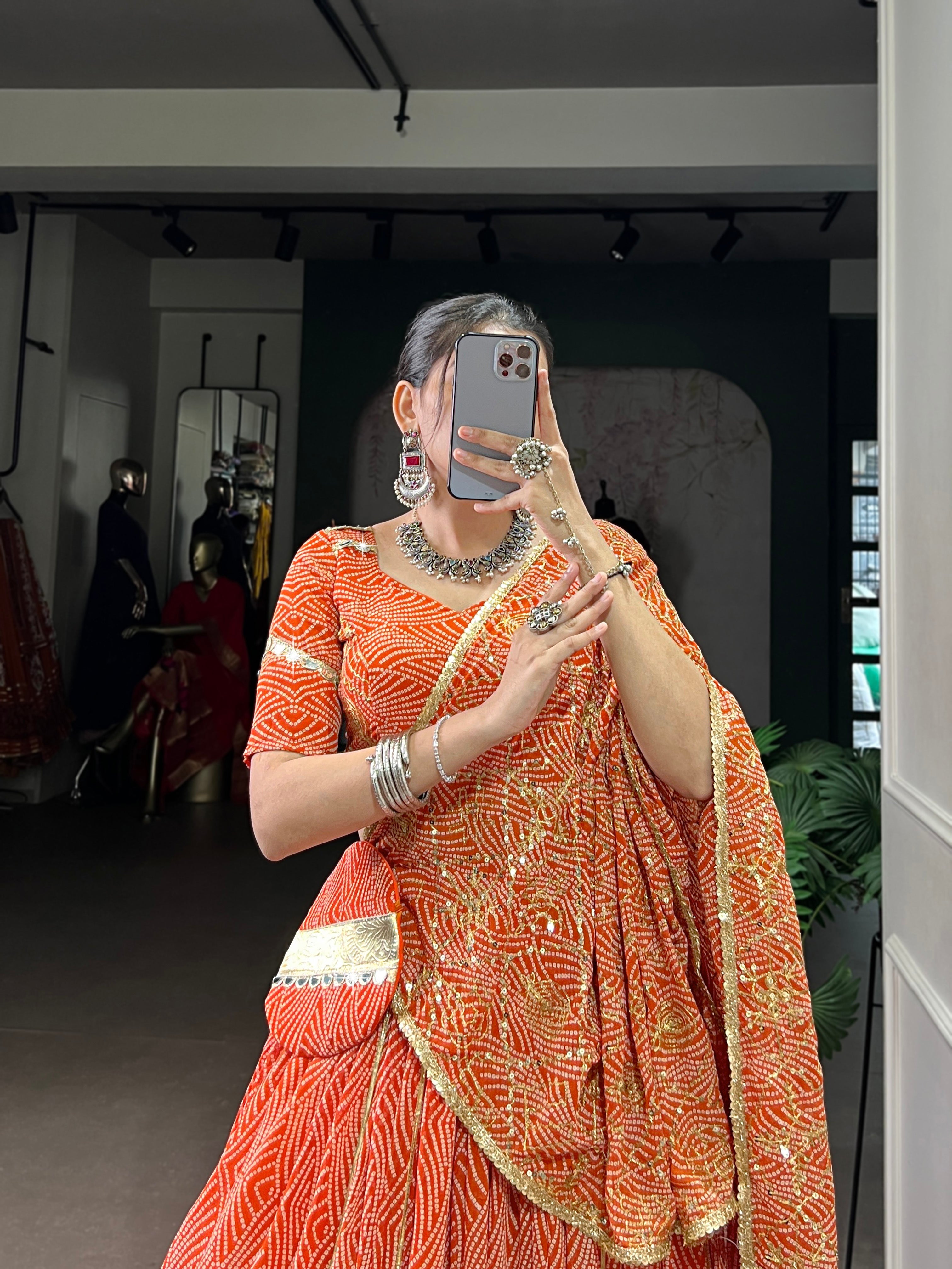 Bandhej-inspired lehenga with golden lace detailing