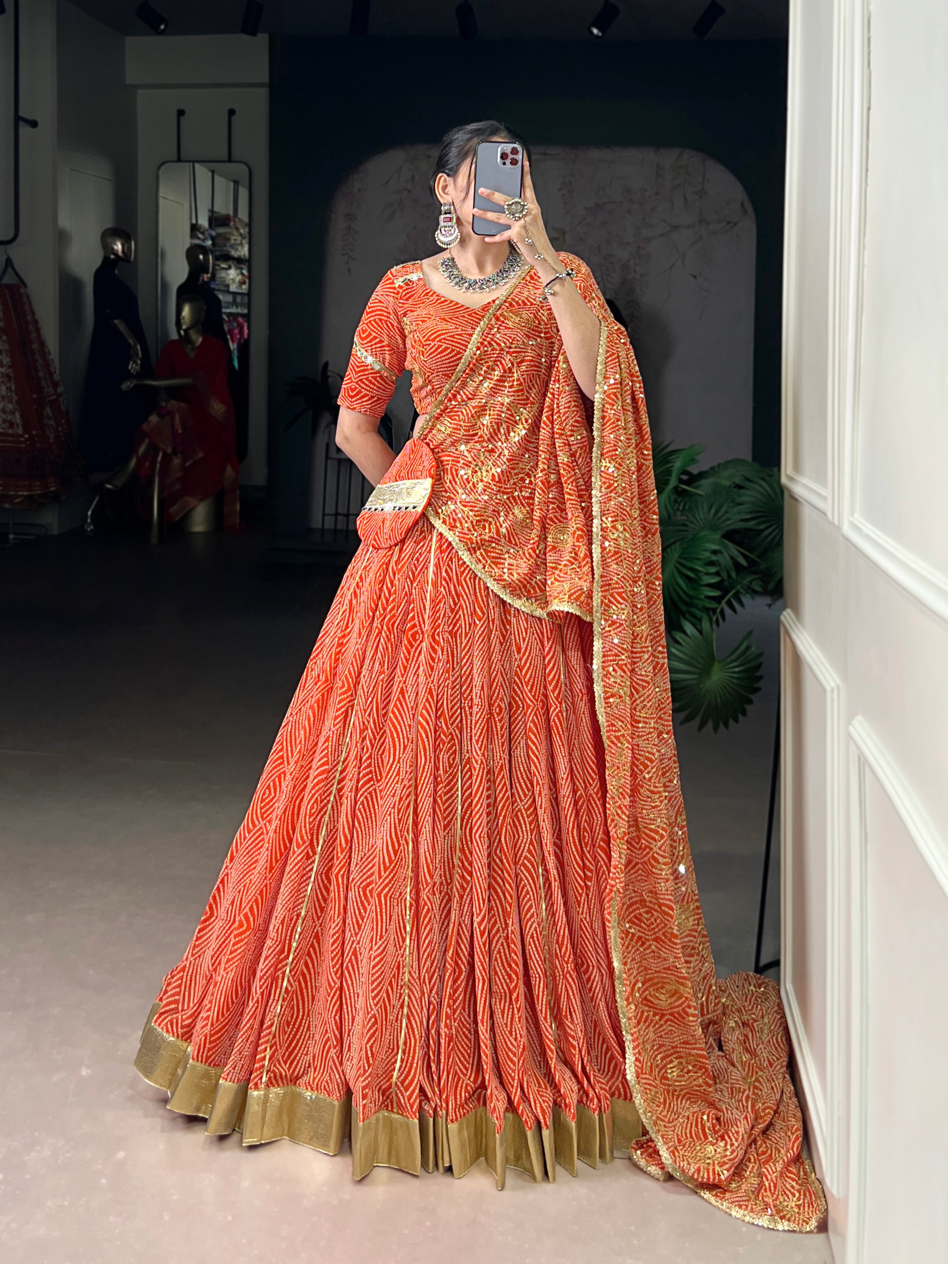 Bandhej-inspired lehenga with golden lace detailing