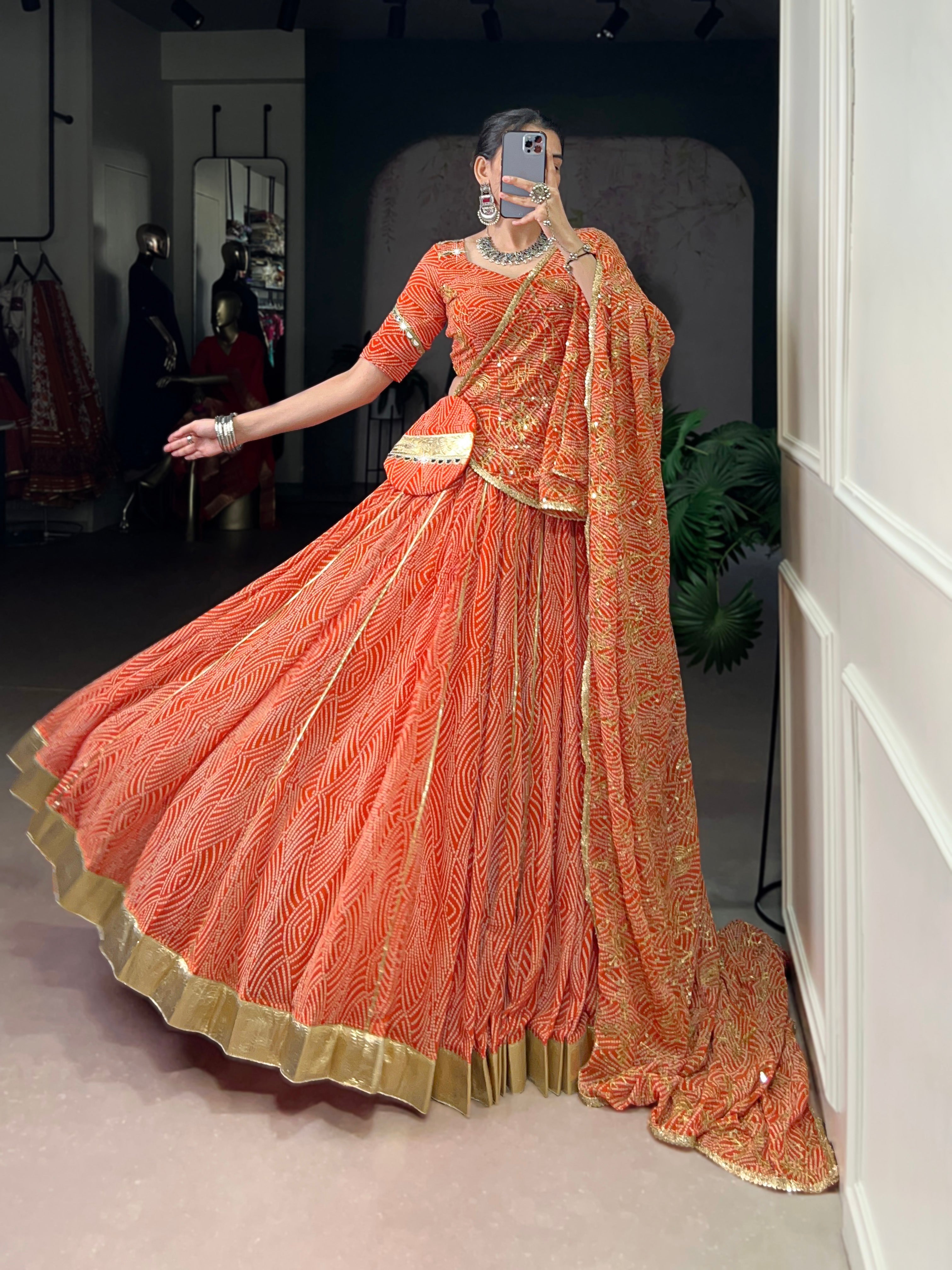 Bandhej-inspired lehenga with golden lace detailing
