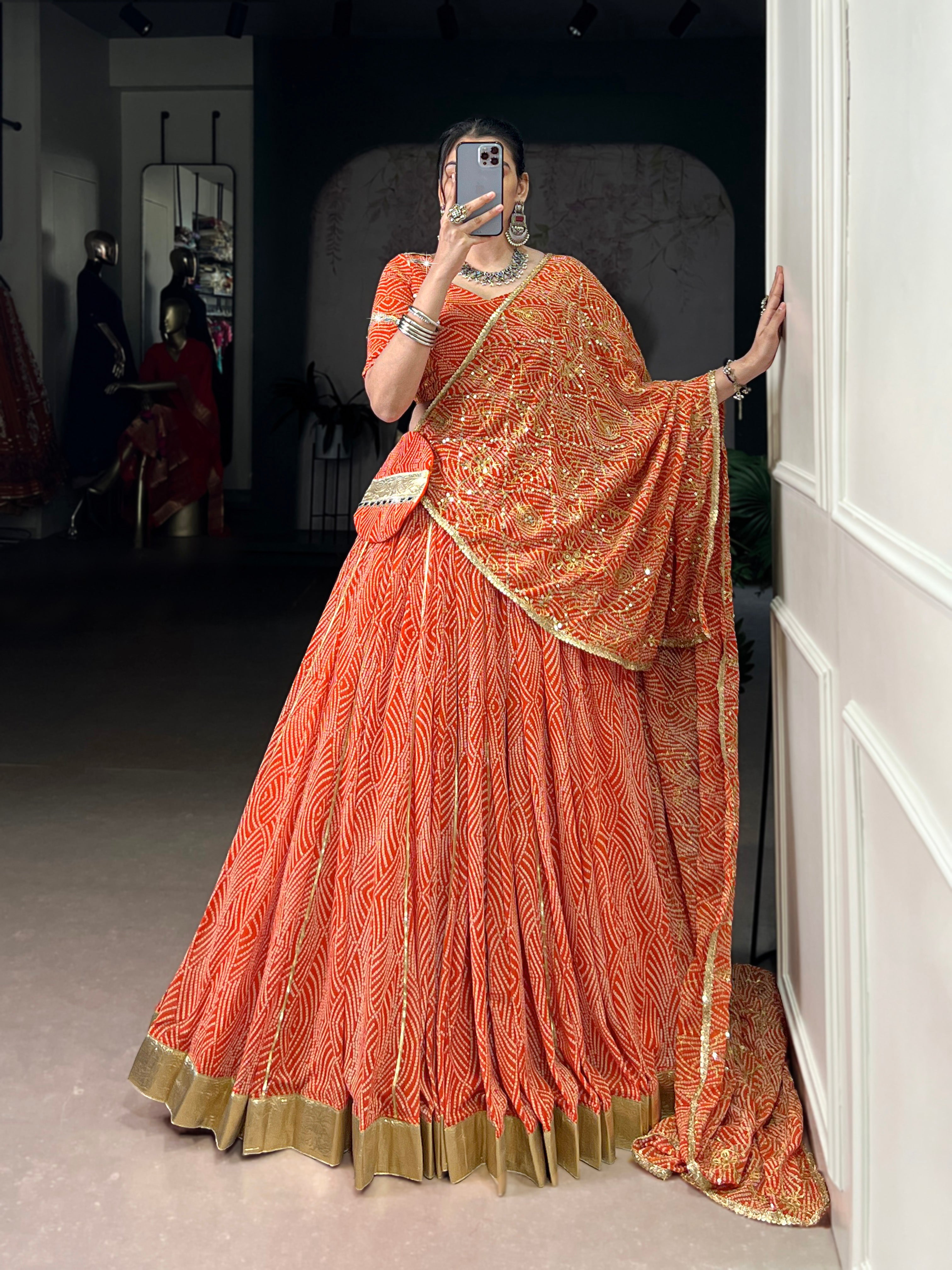 Bandhej-inspired lehenga with golden lace detailing