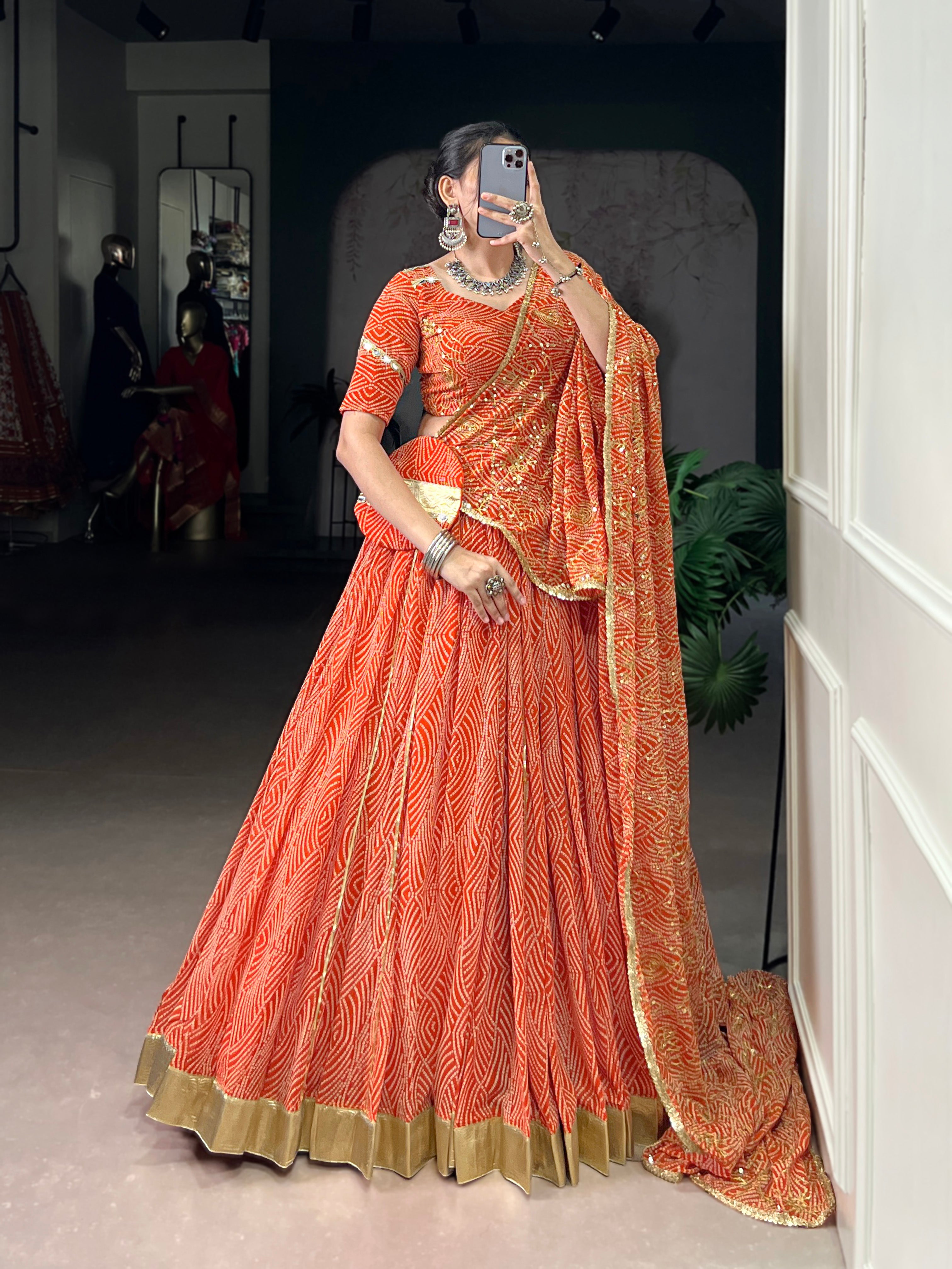 Bandhej-inspired lehenga with golden lace detailing