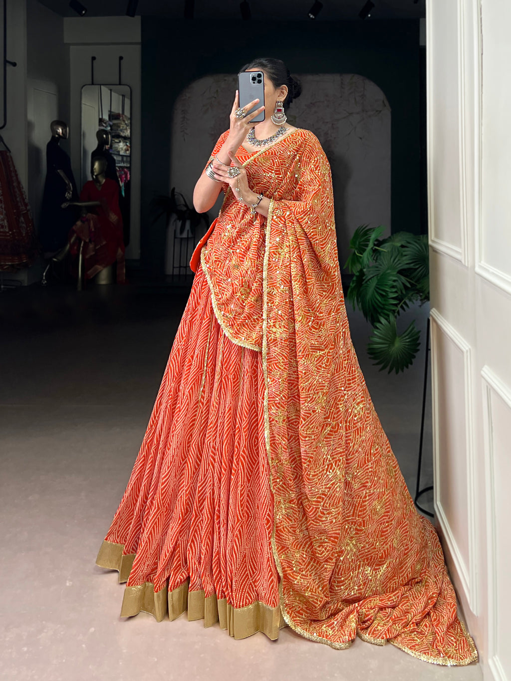 Bandhej-inspired lehenga with golden lace detailing