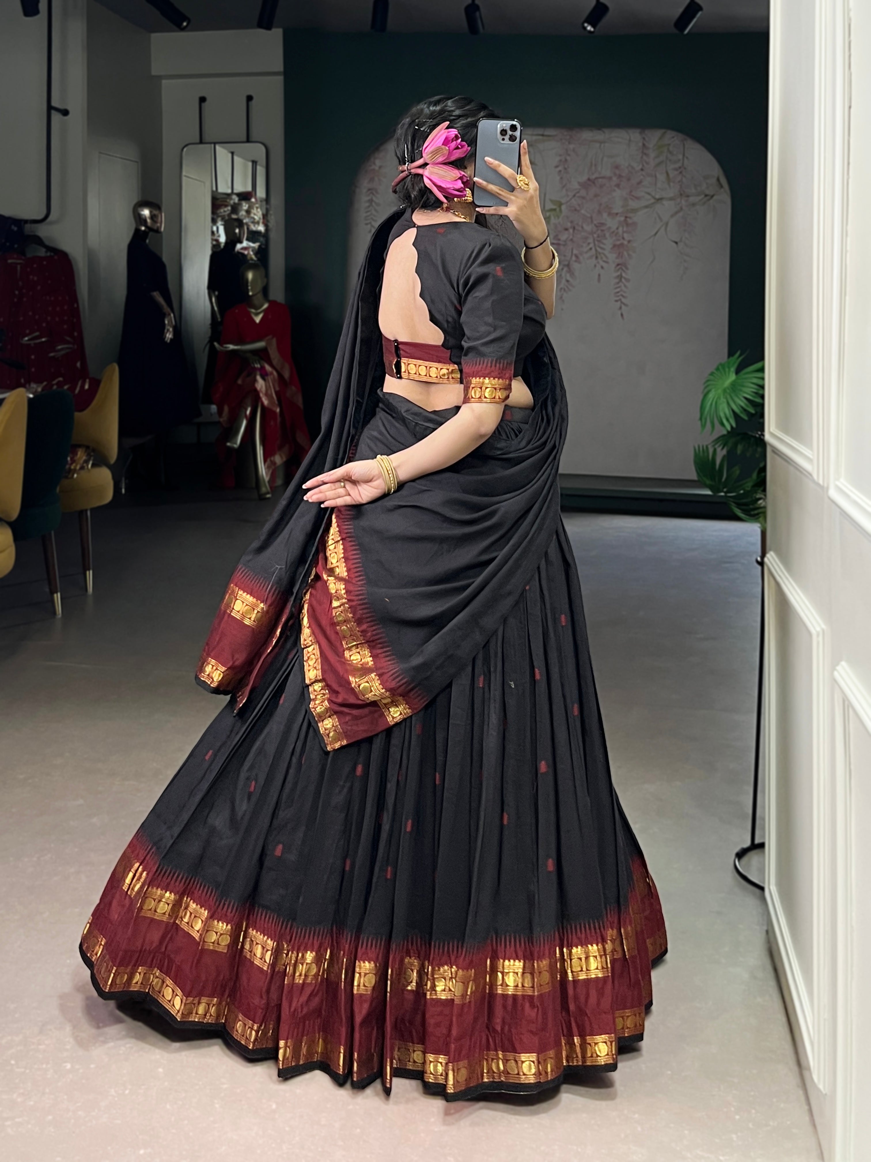 Classic maroon lehenga with a traditional green border