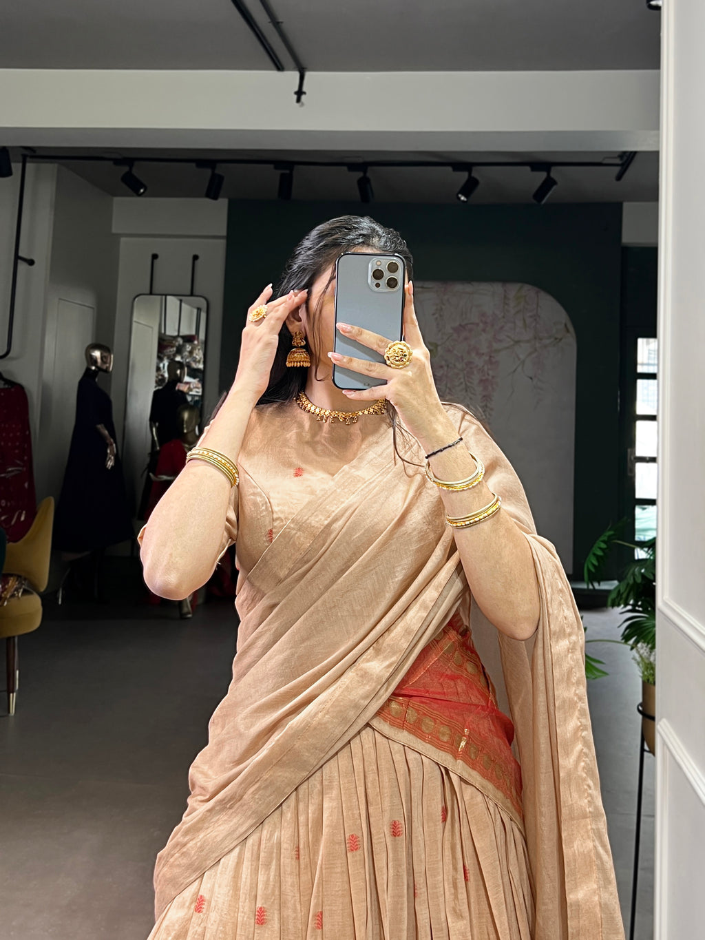 Classic maroon lehenga with a traditional green border