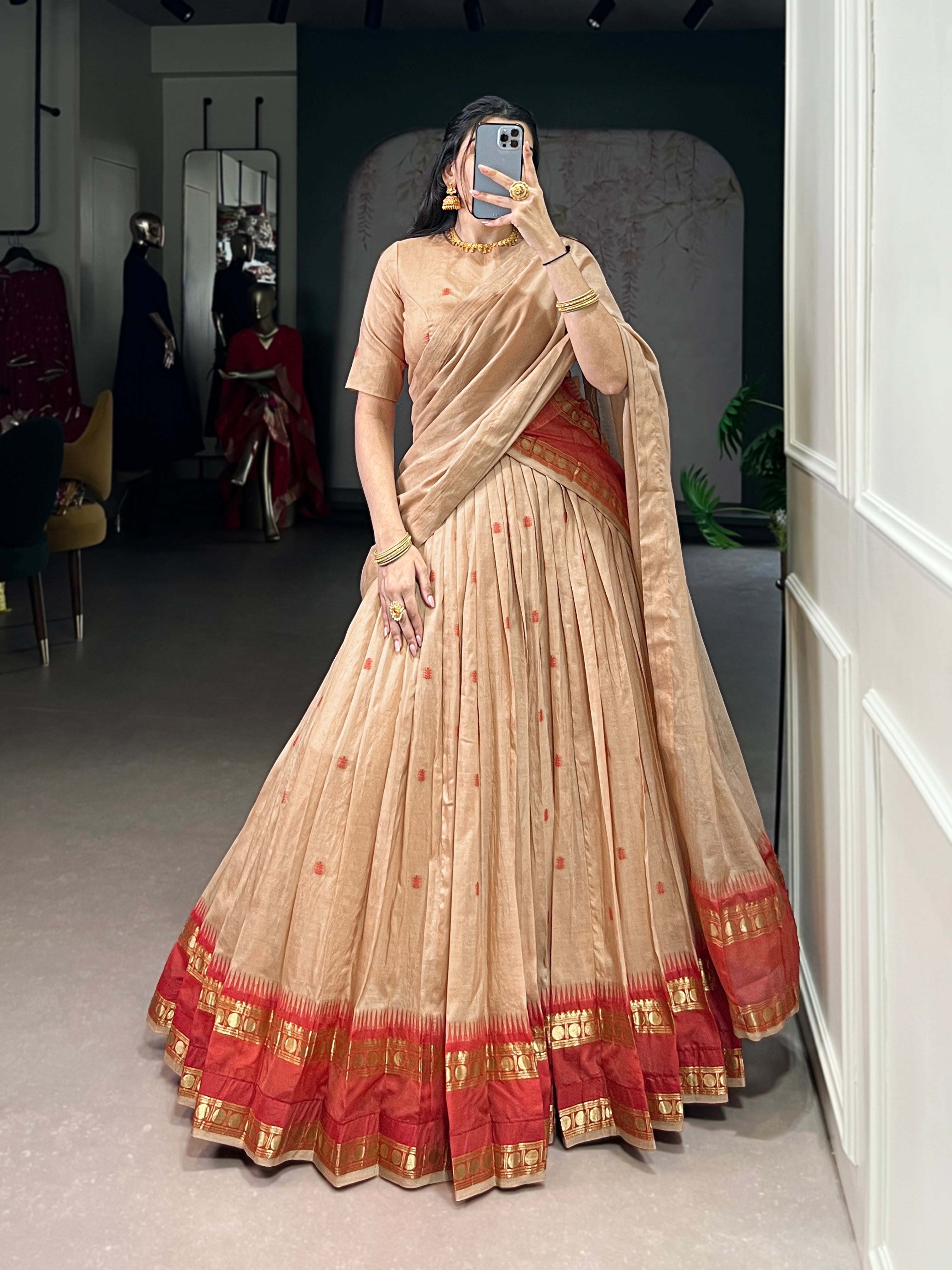 Classic maroon lehenga with a traditional green border