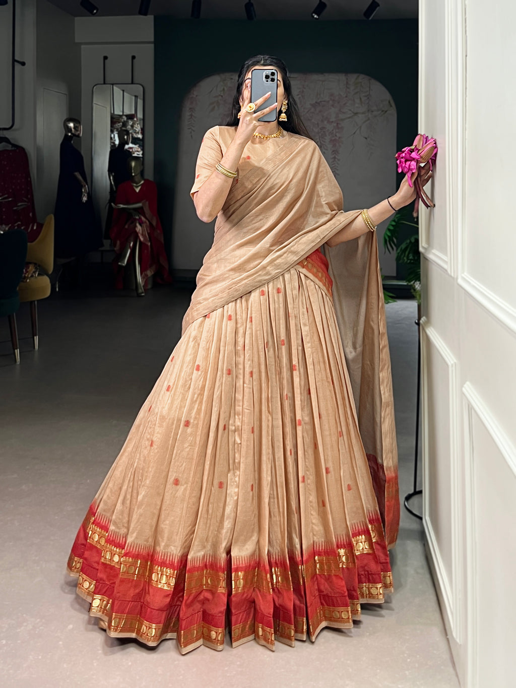 Classic maroon lehenga with a traditional green border
