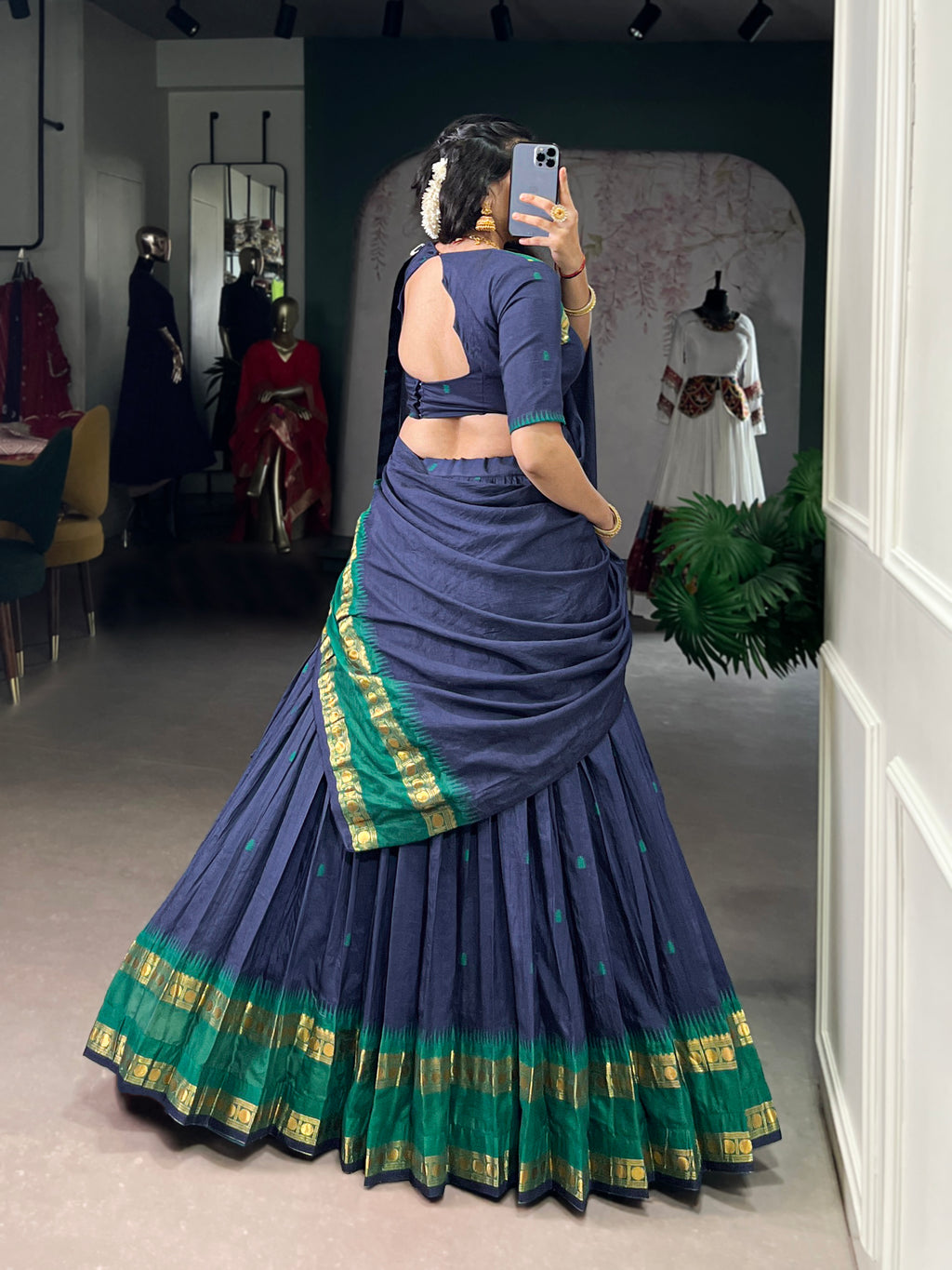 Classic maroon lehenga with a traditional green border