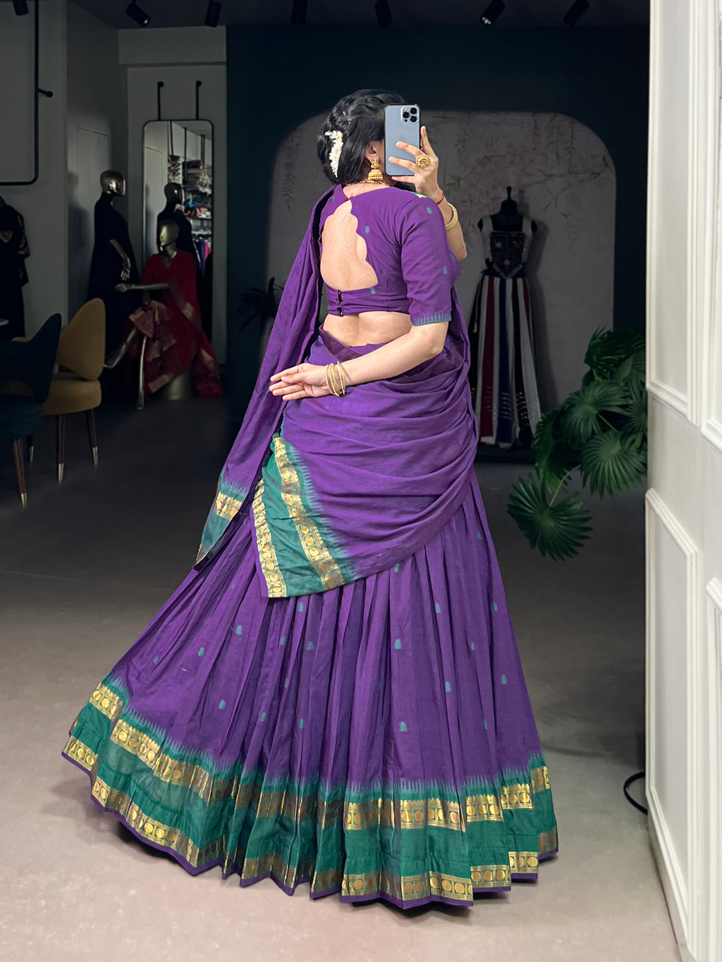 Classic maroon lehenga with a traditional green border
