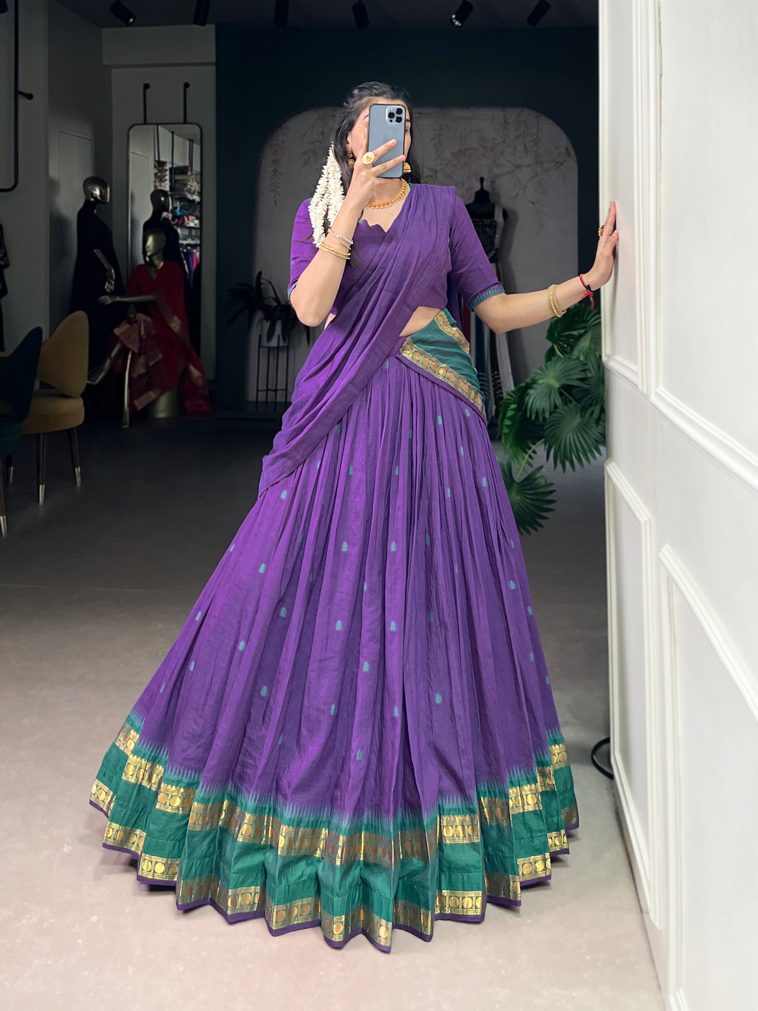 Classic maroon lehenga with a traditional green border