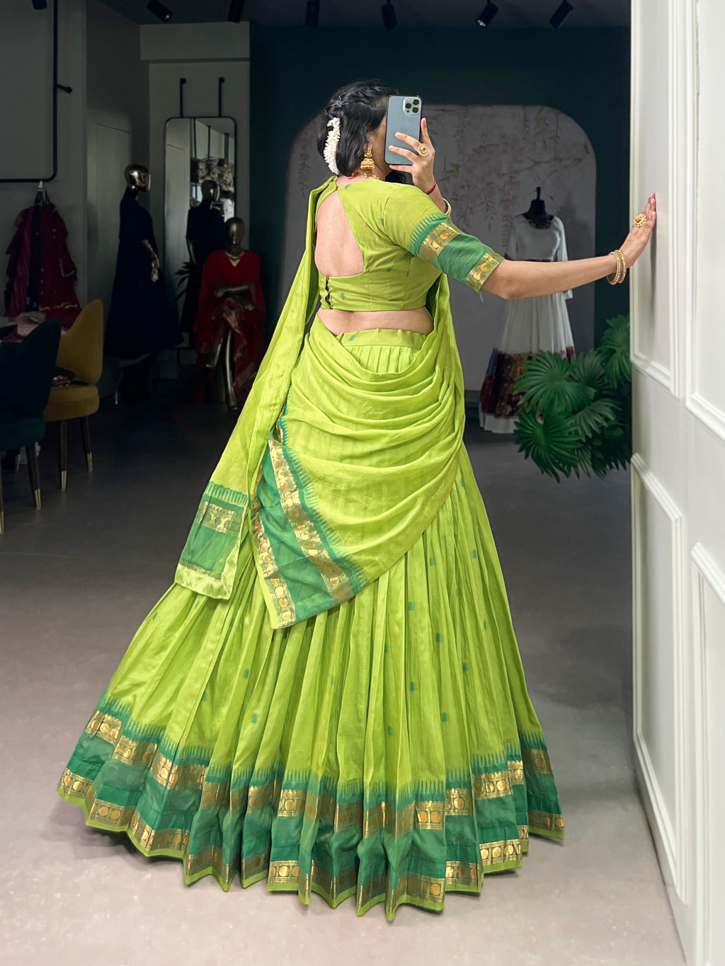 Classic maroon lehenga with a traditional green border