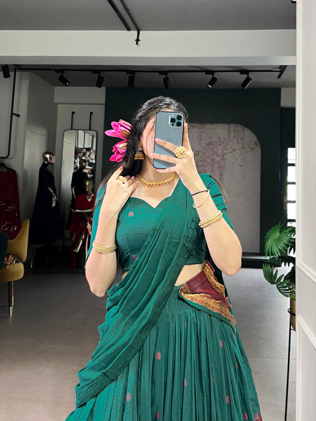 Classic maroon lehenga with a traditional green border