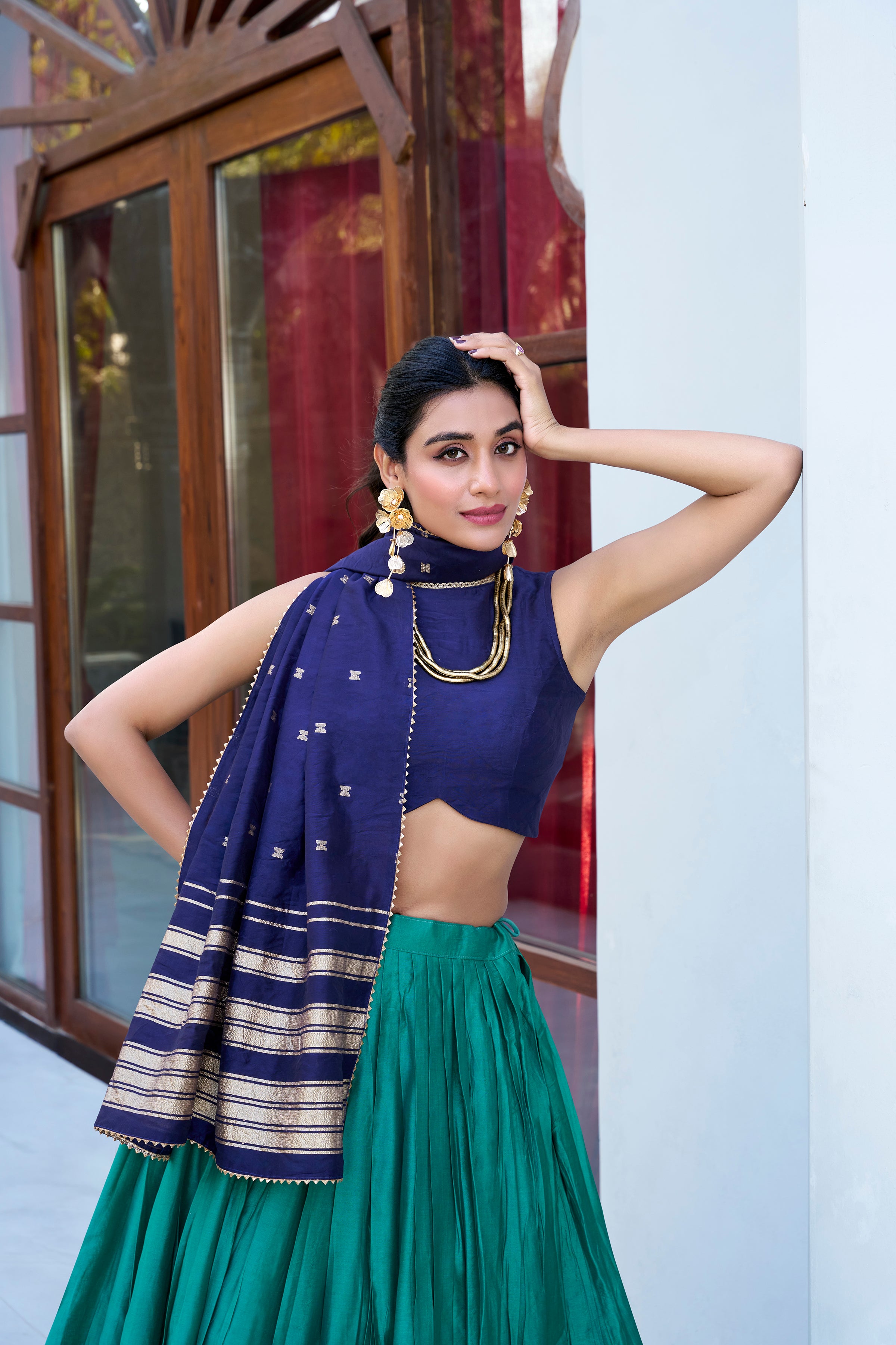 Regal sophistication in a stunning cream and purple lehenga.