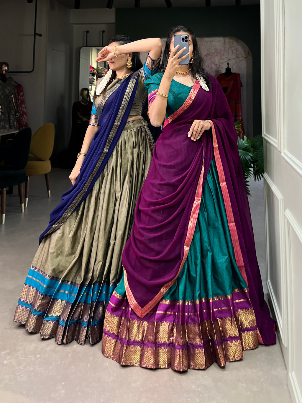It's all in the details: the graceful drape, the grand border, and those classic sleeves
