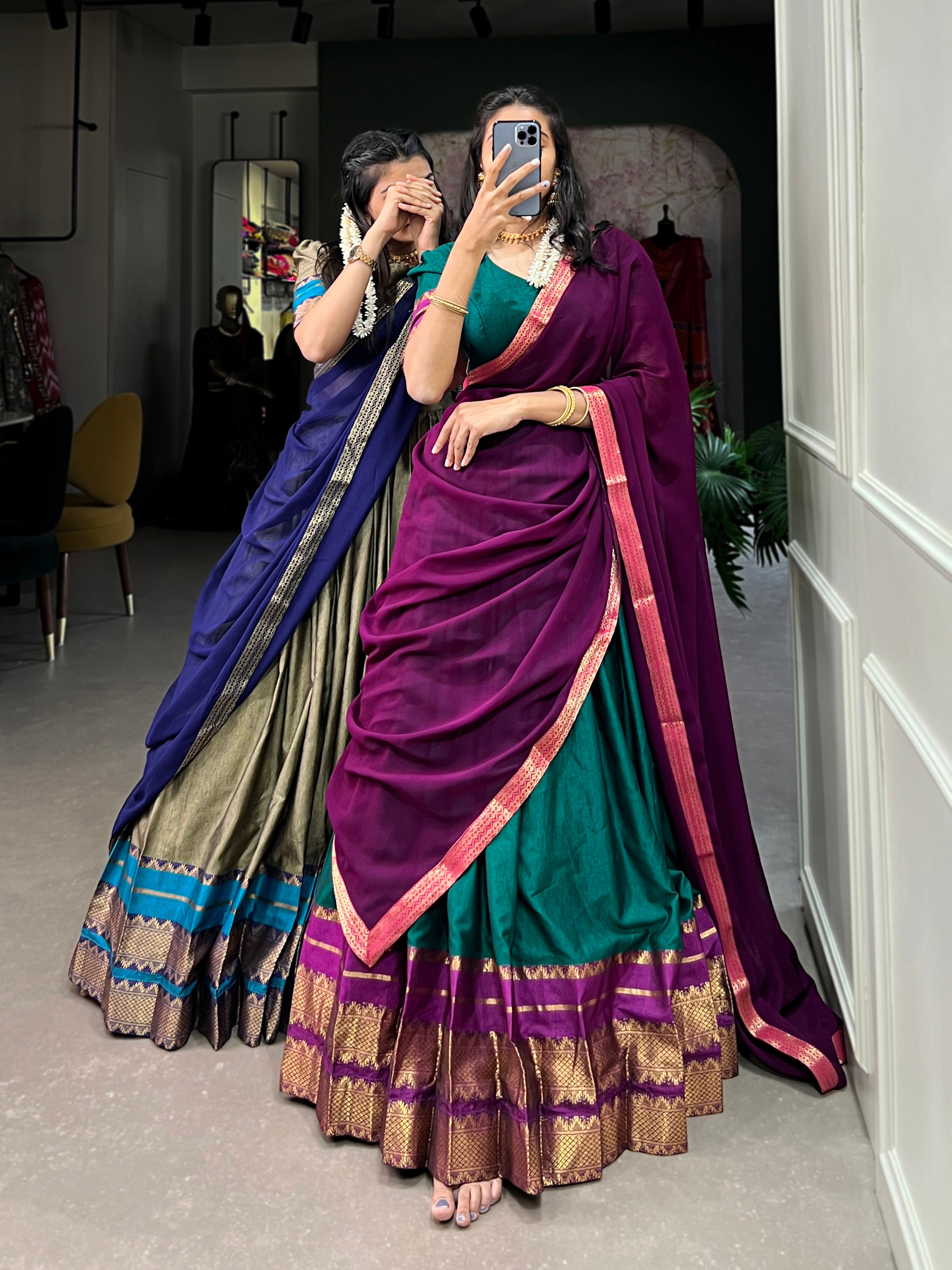 It's all in the details: the graceful drape, the grand border, and those classic sleeves
