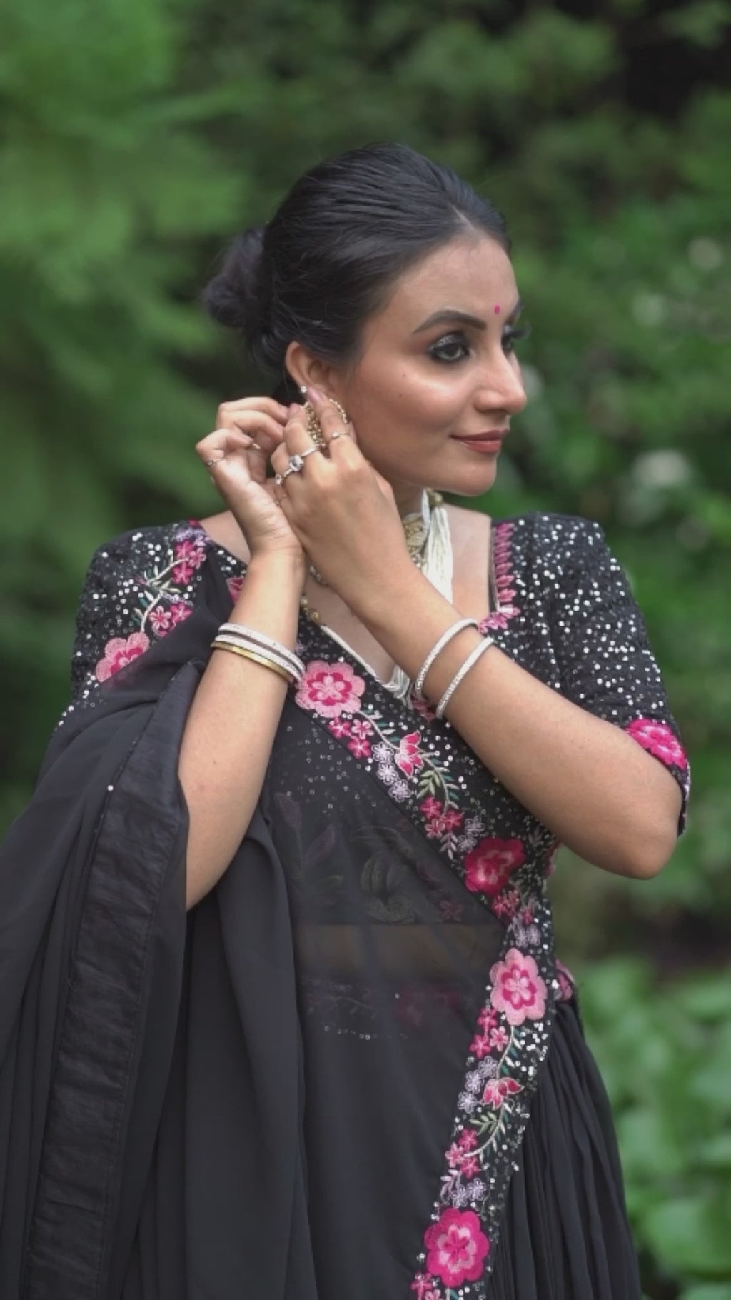 Elegant Black Lehenga Choli with Rani Pink Floral Embroidery