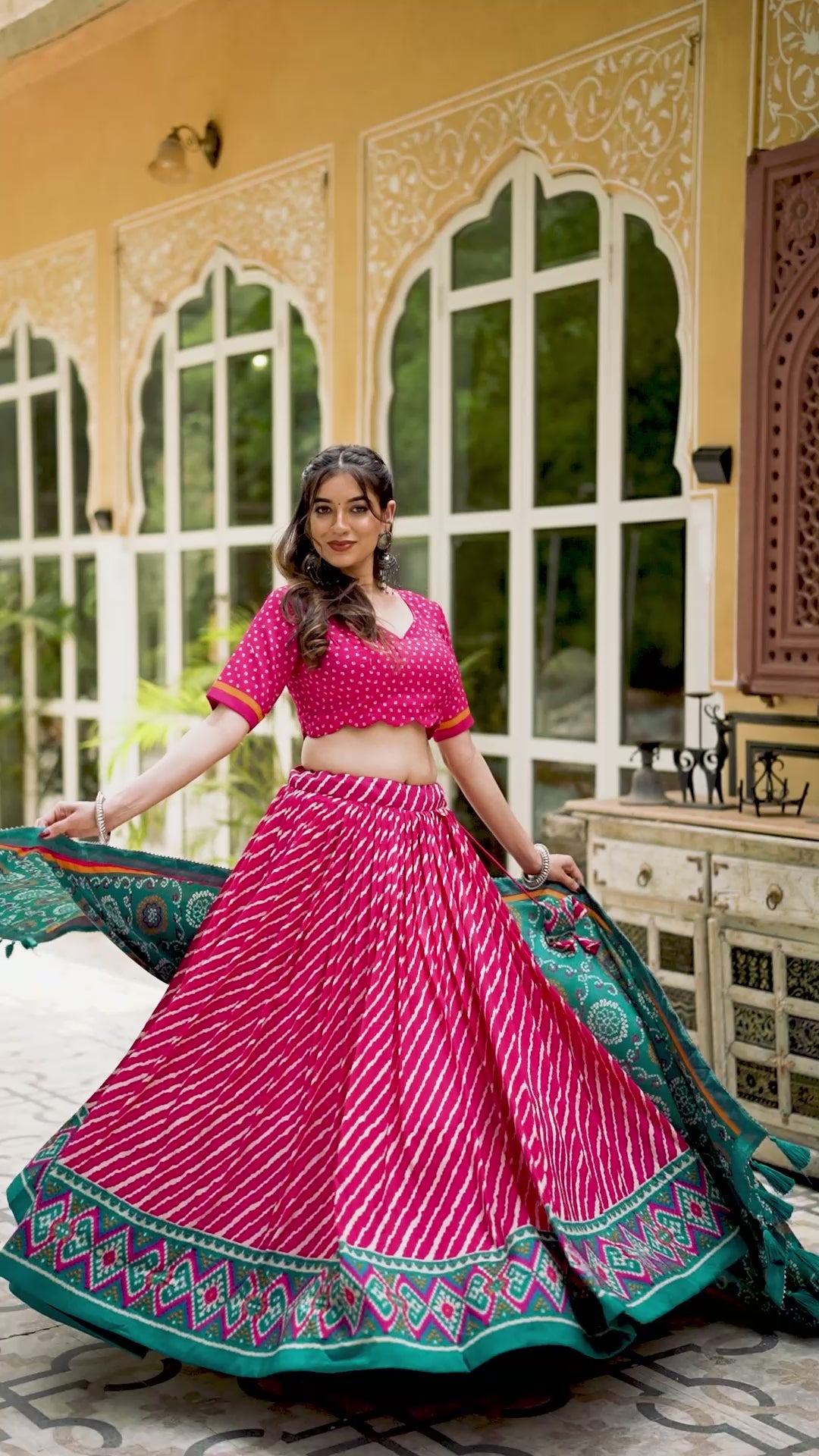 Vibrant Pink Bandhej Lehenga with Contrast Teal Dupatta