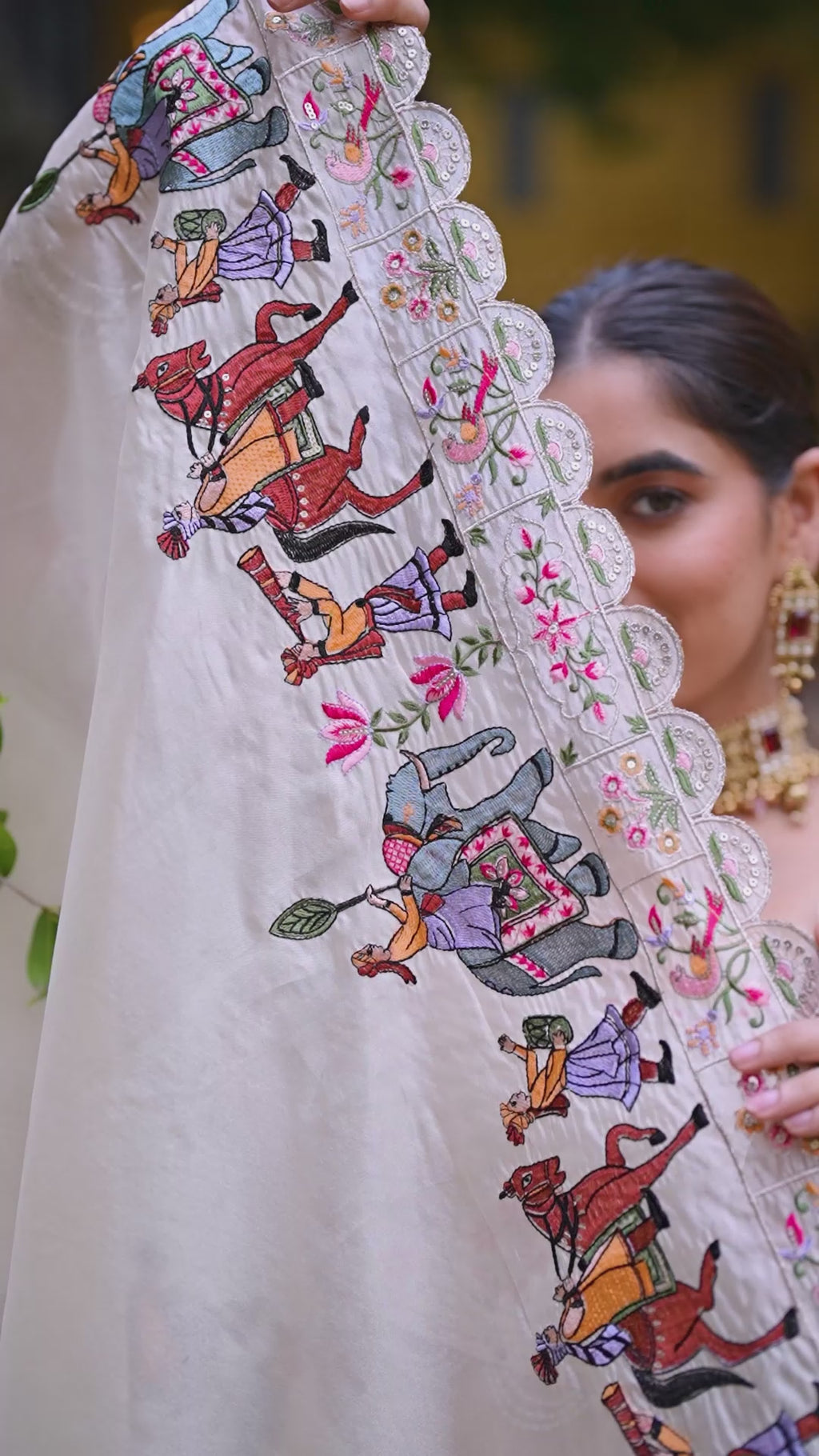 Elegant Cream Lehenga with a Hand-Embroidered Baraat Dupatta