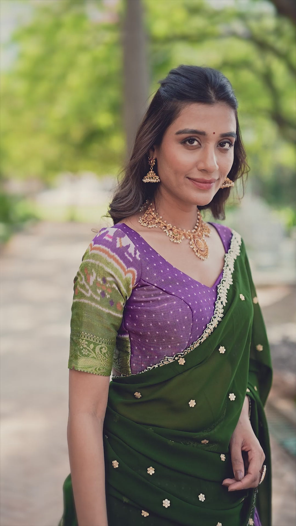 Elegant Woman in a Traditional Gujarati Patola Lehenga Choli.